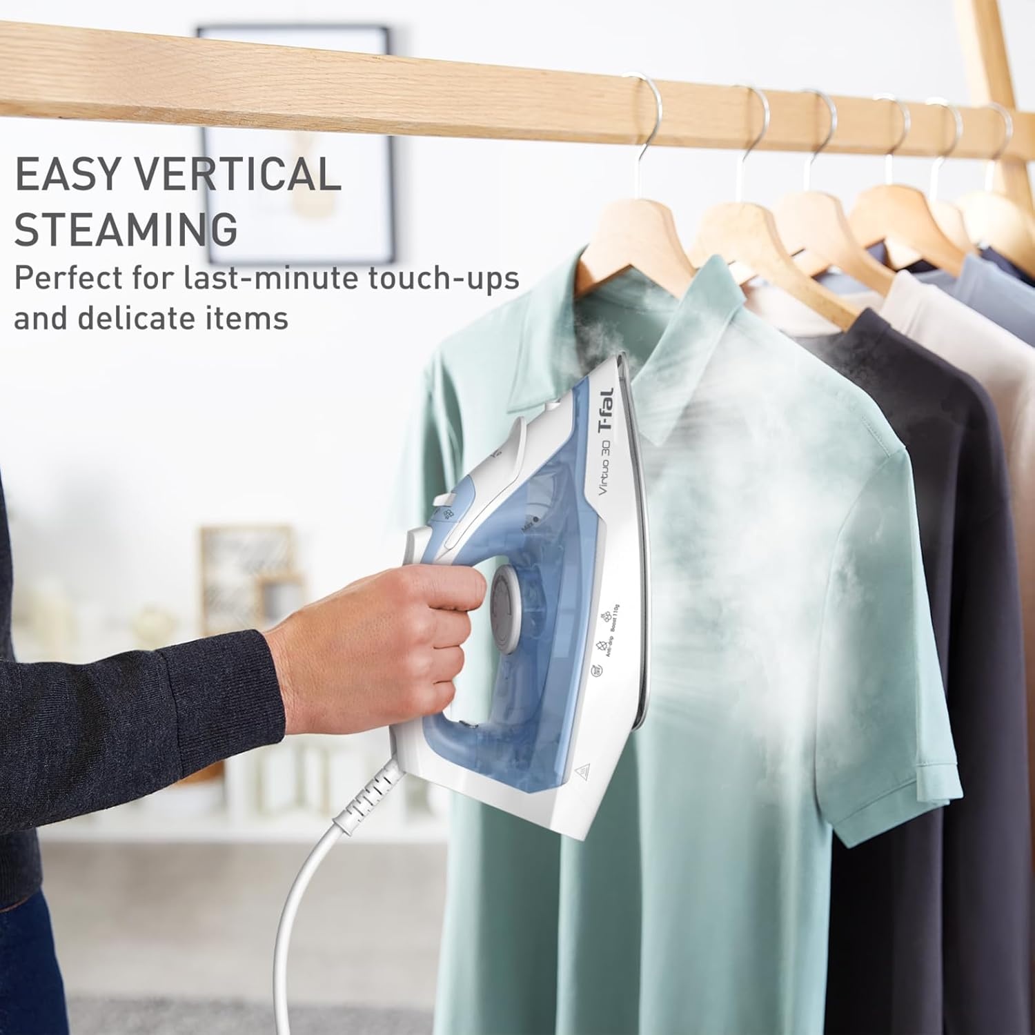 image:imageTFal Virtuo Steam Iron for Clothes with Retractable Cord Portable Iron and Steamer for Clothes Ceramic Nonstick Soleplate 1500 Watts AntiDrip AutoOff Scratch Resistant Grey512 in x 1181 in x 709 in